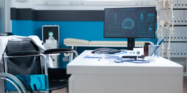 Consultório com cadeira de rodas